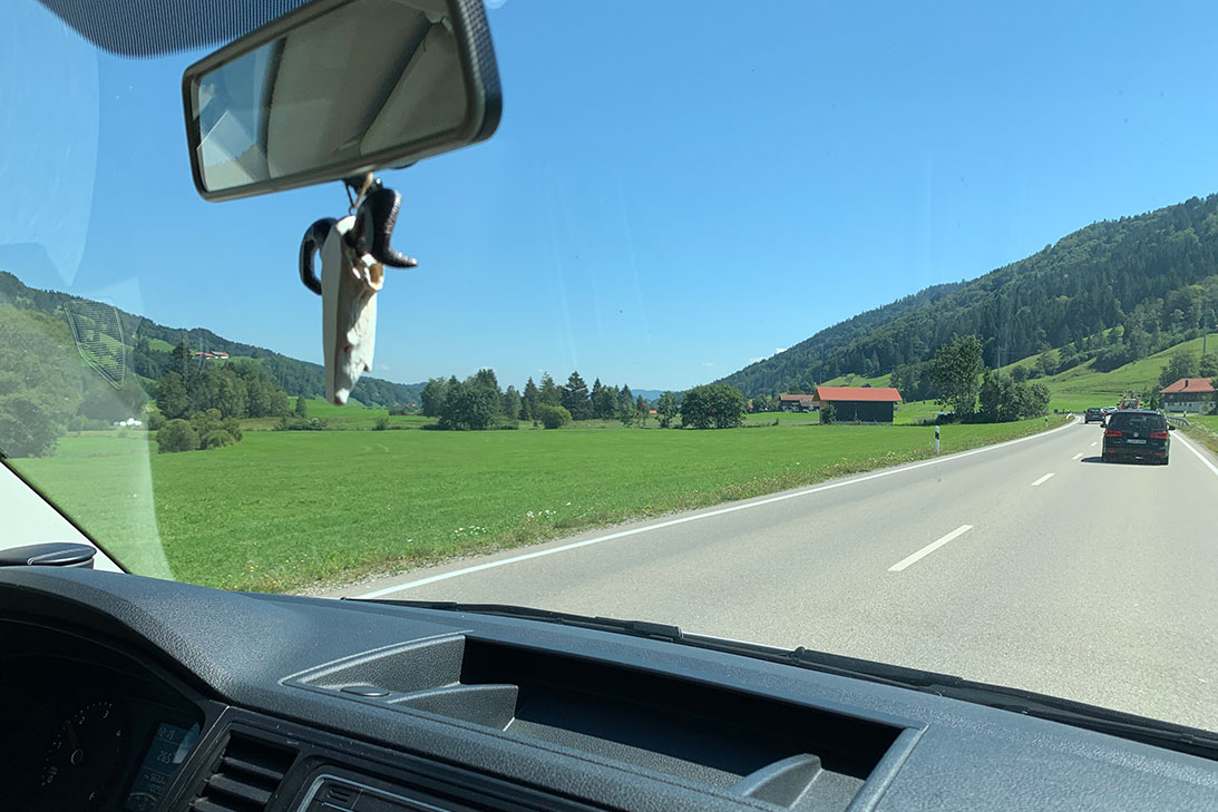 A car parked on the side of a road

Description automatically generated