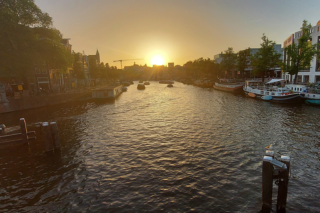 A body of water with boats in it

Description automatically generated